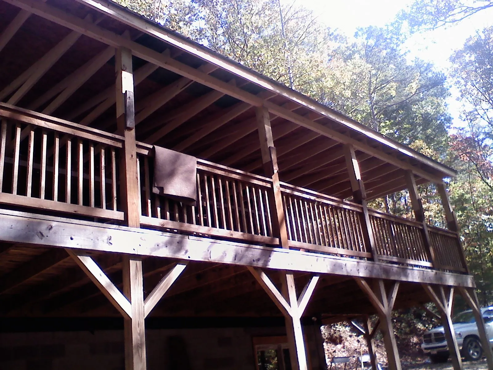 Timber framing under a new elevated porch and deck — Roof Leak Repair in Saltillo by Roofing Brothers